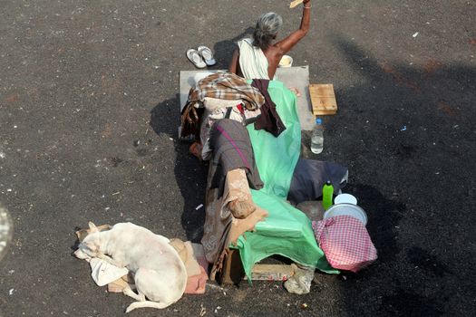 Beggars in front of Nirmal, Hriday, Home for the Sick and Dying Destitutes, one of the buildings established by the Mother Teresa and run by the Missionaries of Charity in Kolkata, India on February 10, 2014.