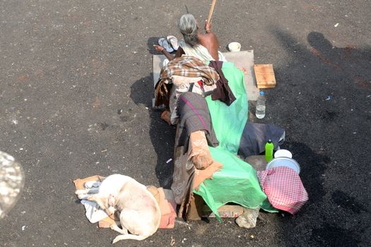 Beggars in front of Nirmal, Hriday, Home for the Sick and Dying Destitutes, one of the buildings established by the Mother Teresa and run by the Missionaries of Charity in Kolkata, India on February 10, 2014.