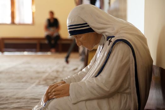 The statue of Mother Teresa in the chapel of the Mother House, Kolkata, India at 8 February 2014. The statue was made in the pose in which the Mother prayed.