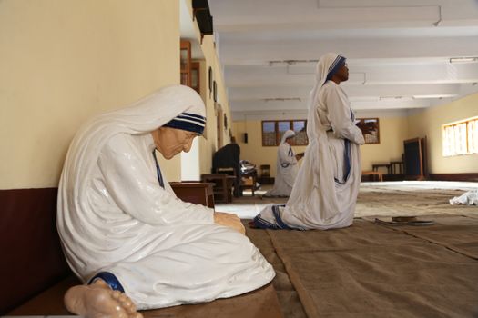 The statue of Mother Teresa in the chapel of the Mother House, Kolkata, India at 8 February 2014. The statue was made in the pose in which the Mother prayed.