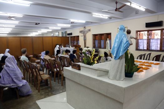 Pilgrims pray beside the tomb of Mother Teresa in Kolkata, West Bengal, India on February 07,2014.