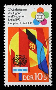 Stamp printed in GDR shows Festival Emblem, TV Tower, 10th Festival of Youths and Students, Berlin, circa 1973