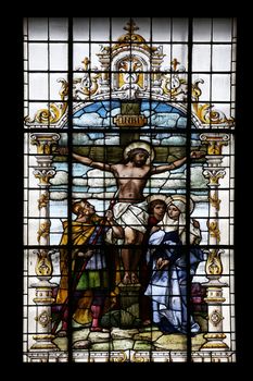 Crucifixion, Jesus died on the cross, stained glass window in the Basilica of the Sacred Heart of Jesus in Zagreb, Croatia on December 27, 2013