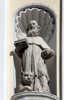 Saint Jerome on the portal of Holy Cross, parish Church of the Immaculate Conception of the Virgin Mary in Lepoglava, Croatia