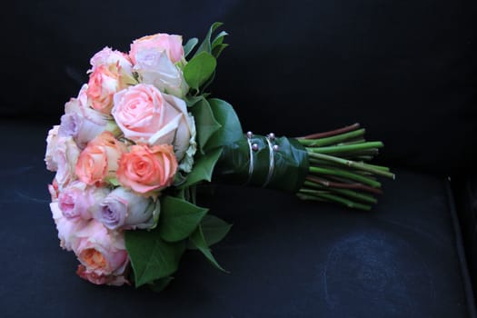 Pastel roses in a bridal bouquet