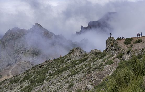 FUNCHAL,PORTUGAL-MARCH 24,unidentified people walking on the top of the pico arieiro mountains on march 24 2016 in Funchal,this mountain is one of the 2 highest on Madeira island