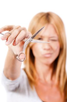 Beautiful hairdresser with scissors / Isolated on white