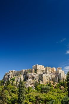 Ancient Acropolis during daytime. Athens Greece. Lot of copyspace.