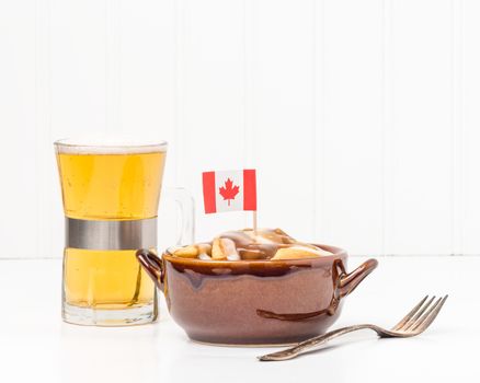 Bowl of poutine, a uniquely Canadian dish originating from the Province of Quebec.