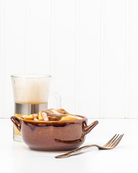 Bowl of poutine, a uniquely Canadian dish originating from the Province of Quebec.