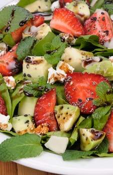 Salad spinach with strawberries, avocado, mint, ricotta and sesame,poppy seeds 