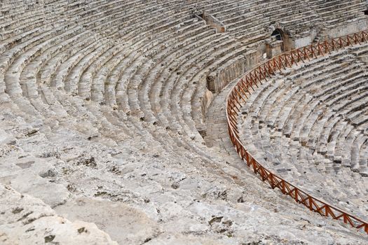 View of Hyerapolis Ancient City with a historical stone amphitheater.