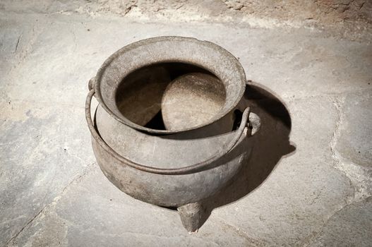 Vintage metal pot for cooking.