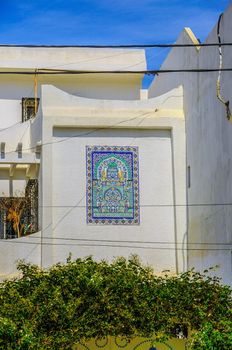 Oriental ornament on white wall in Hammamet Tunisia.