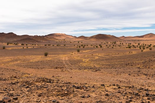 road to the Sahara desert comes to mountains, Morocco