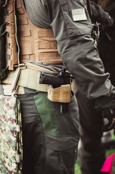 men in military uniform with weapon on a mission