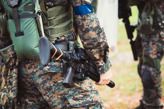 men in military uniform with weapon on a mission