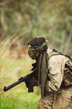 men in military uniform with weapon on a mission