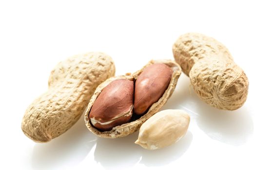 groundnut in the skin close-up on a white background