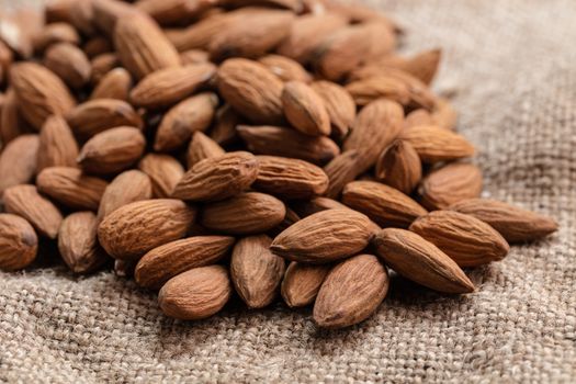 the natural almonds closeup on vintage background
