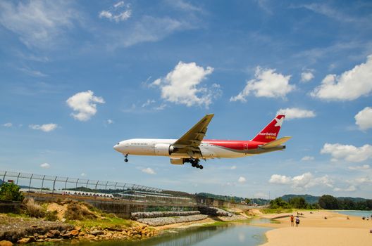 PHUKET - MAY 5 : Nordwind airlines airplane landing at Phuket International airport, runway near the beach, on May 5, 2016 Phuket, Thailand.