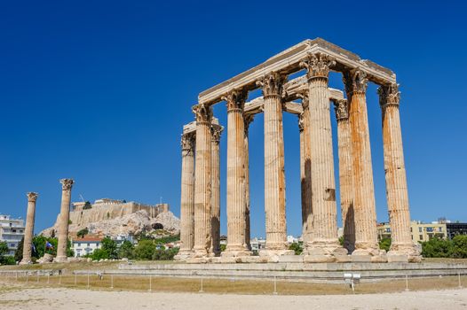 Olympeion, Ancient Temple of Olympian Zeus. Athens Greece. Acropolis at background.