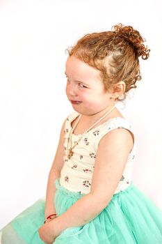 Fashion little girl in green dress, in catwalk model pose, stock photo. Image 10