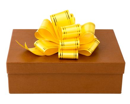 Brown gift box with yellow ribbon and bow, isolated on white