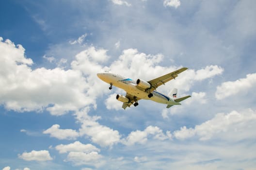 PHUKET - MAY 5 : Bangkok Airways airplane landing at Phuket International airport, runway near the beach, on May 5, 2016 Phuket, Thailand.