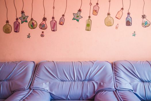 Sofa wall purple, pink cocktails. And drinks