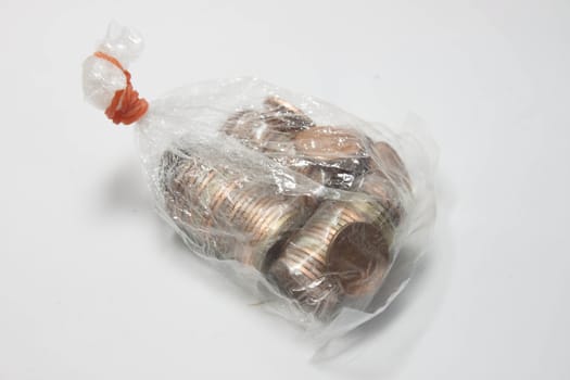 Clear plastic bag put dollars THB Thailand. Tied with a rubber
