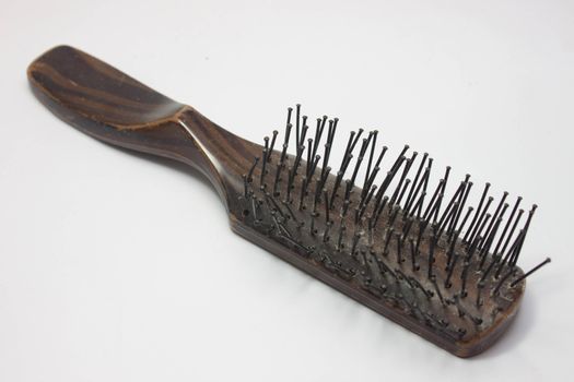 Comb. Wooden old combon the blackground