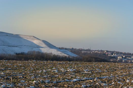 Snowy Mountain a landfill, dump in the winter.