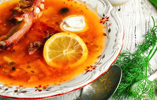 National Ukrainian dish is soup with smoked meat and lemon