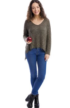 Portrait of a beautiful woman holding a fresh red apple, isolated in white background