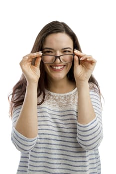 Lovely woman smiling at the camera with her arms folded