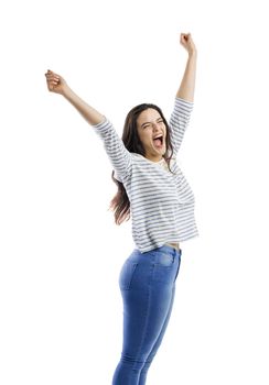 Happy woman with arms up and yelling of happiness 