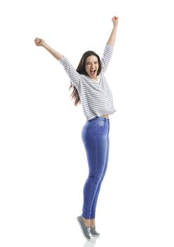 Lovely happy woman jumping of joy 