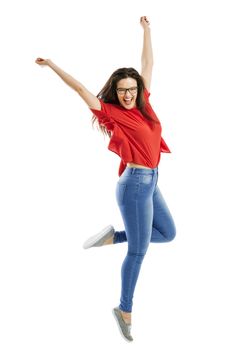 Lovely happy woman jumping of joy 