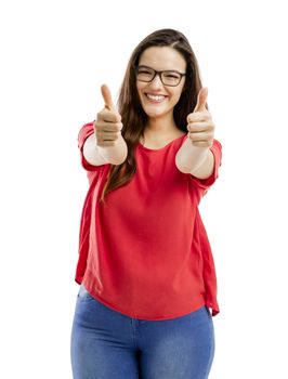 Beautiful and confident woman with thumbs up, isolated over white background 