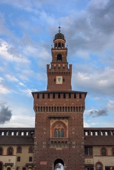 Tower of the Sforza Castle (Castello Sforzesco), a castle in Milan, Italy at twilight.