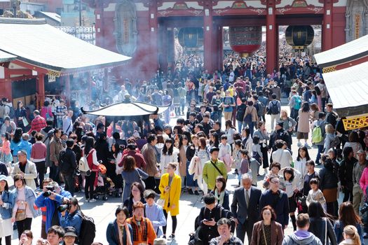 TOKYO, JAPAN - MARCH 29, 2016: unidentified people visit sensoji temple in Tokyo on 29 March 2016.. Sensoji temple is the most famous attraction in Asakusa, Tokyo, Japan