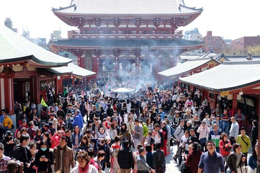 TOKYO, JAPAN - MARCH 29, 2016: unidentified people visit sensoji temple in Tokyo on 29 March 2016.. Sensoji temple is the most famous attraction in Asakusa, Tokyo, Japan