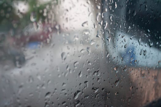 Drops of water on the mirror of the car.