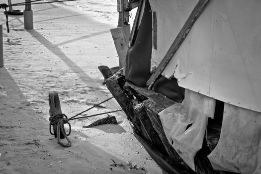 Fishing boat wreckage on the sand