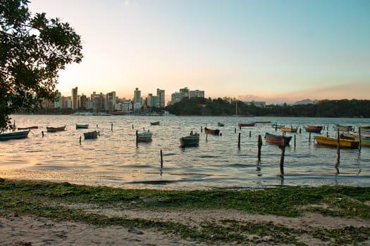 Fishing boats on the beache at sunset