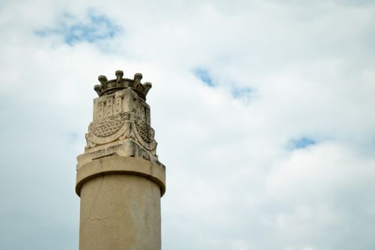high section of monumento against cloudy sky