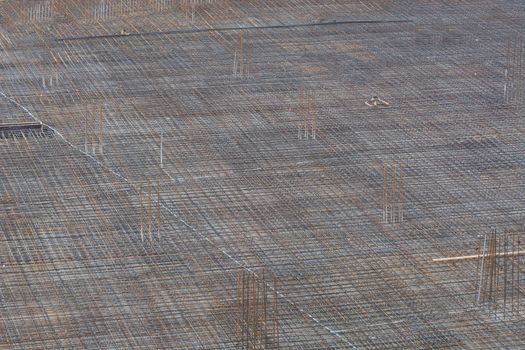 Foundation building of steel and concrete for the construction of an apartment building with underground parking.