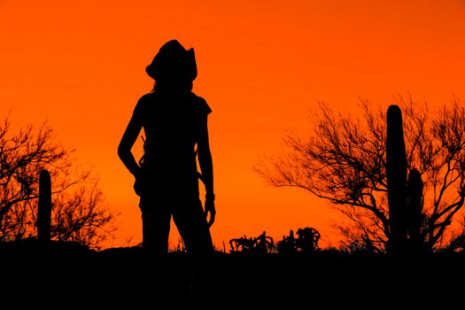 Afternoon desert hiker in the American Southwest in silhouette