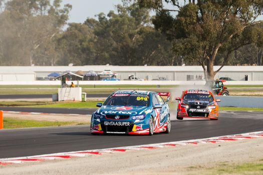 MELBOURNE, WINTON/AUSTRALIA, 20 MAY , 2016: Aussie Race cars battle it out at the Virgin Australia Supercars Championship at Winton.